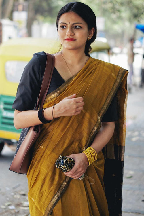 Load image into Gallery viewer, Ethnic Mustard Cotton Silk Saree With Glorious Blouse Piece
