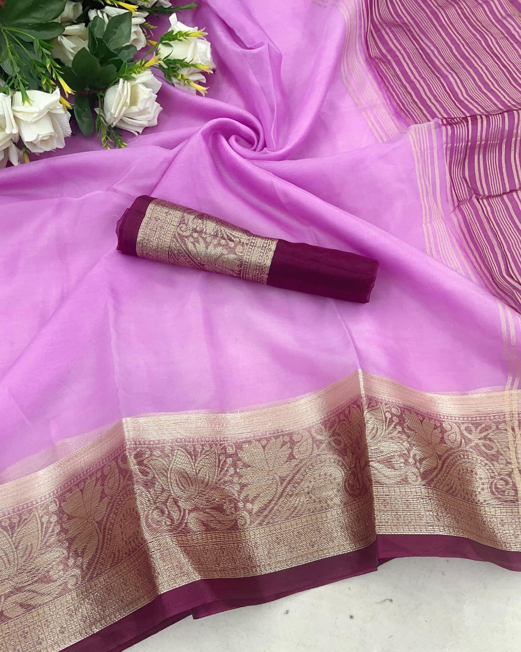 Ravishing Lavender Orgenza  Silk Saree With Intricate Blouse Piece