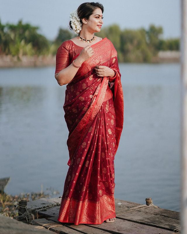 Mellifluous Red Soft Silk Saree With Elision Blouse Piece