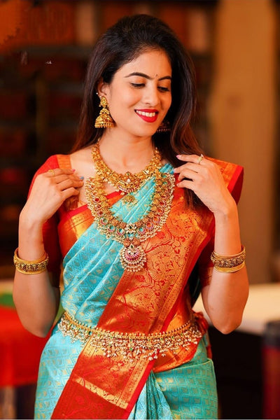 Blissful Turquoise Soft Silk Saree with Ethnic Blouse Piece