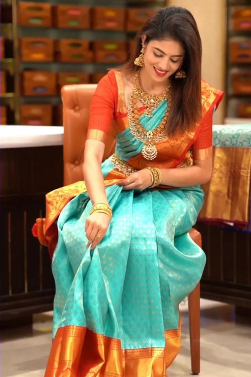 Load image into Gallery viewer, Blissful Turquoise Soft Silk Saree with Ethnic Blouse Piece
