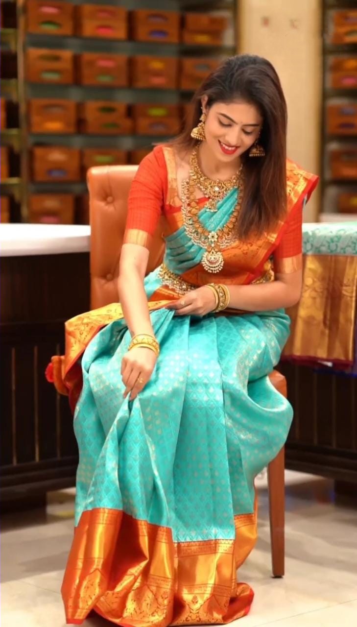 Blissful Turquoise Soft Silk Saree with Ethnic Blouse Piece