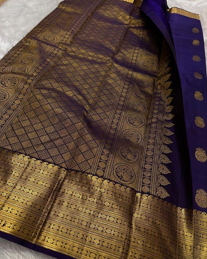 Invaluable Navy Blue Soft Silk Saree With Engrossing Blouse Piece