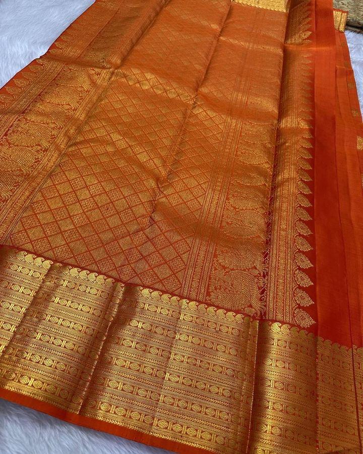 Preferable Orange Soft Silk Saree With Stunner Blouse Piece