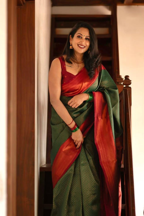 Load image into Gallery viewer, Extraordinary Dark Green Soft Silk Saree With Adorning Blouse Piece
