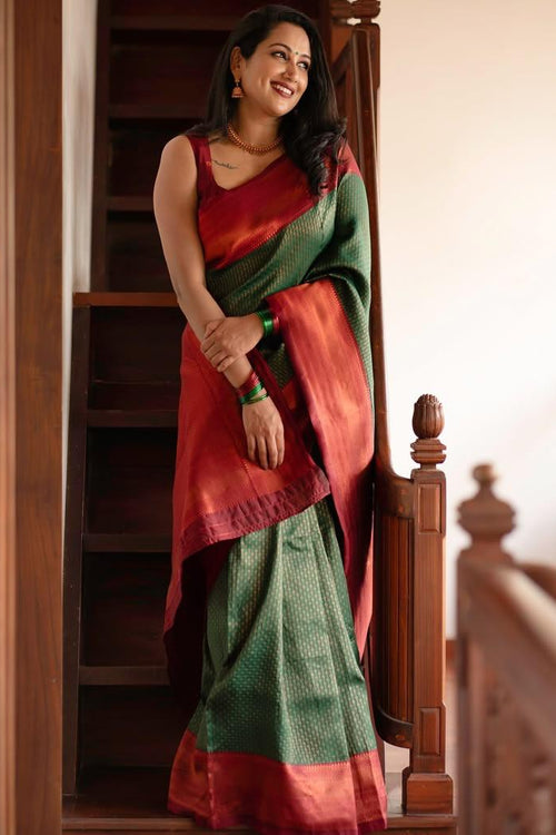 Load image into Gallery viewer, Extraordinary Dark Green Soft Silk Saree With Adorning Blouse Piece
