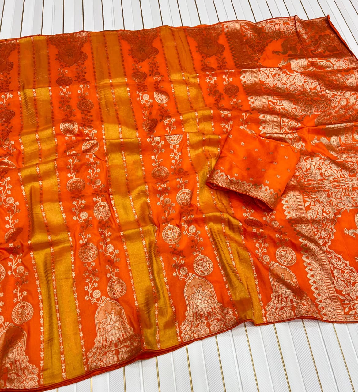 Snazzy Orange Soft Banarasi Tissue Silk Saree With Ethereal Blouse Piece