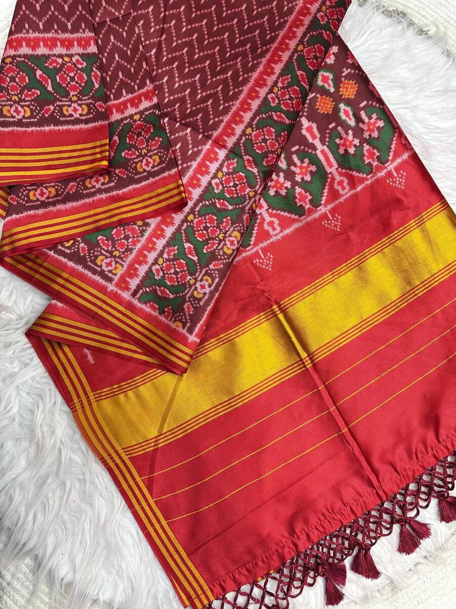 Desultory Wine Ikkat Printed Patola Silk Saree With Adorning Blouse Piece