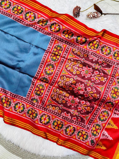 Charming Firozi Ikkat Printed Patola Silk Saree With Hypnotic Blouse Piece