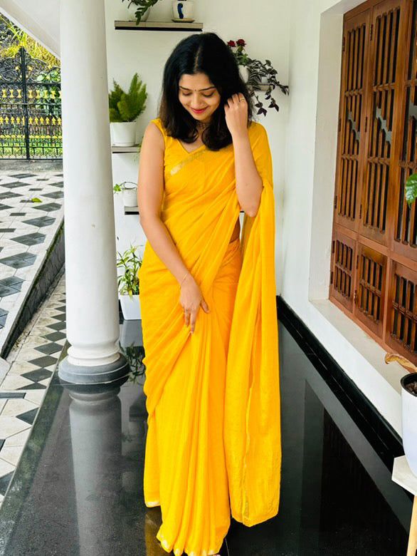 Blooming Yellow Banarasi Georgette Silk Saree With Wonderful Blouse Piece