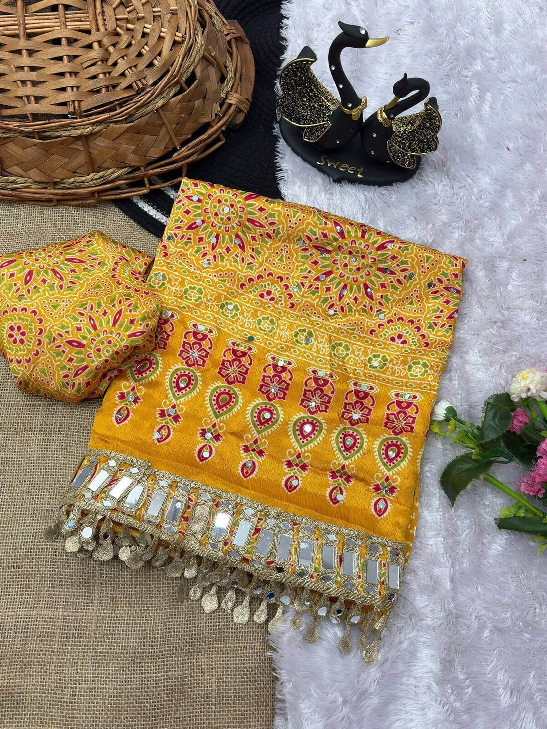 Enticing Yellow Ajrakh Printed Mirror Work Satin Silk Saree With Surreptitious Blouse Piece