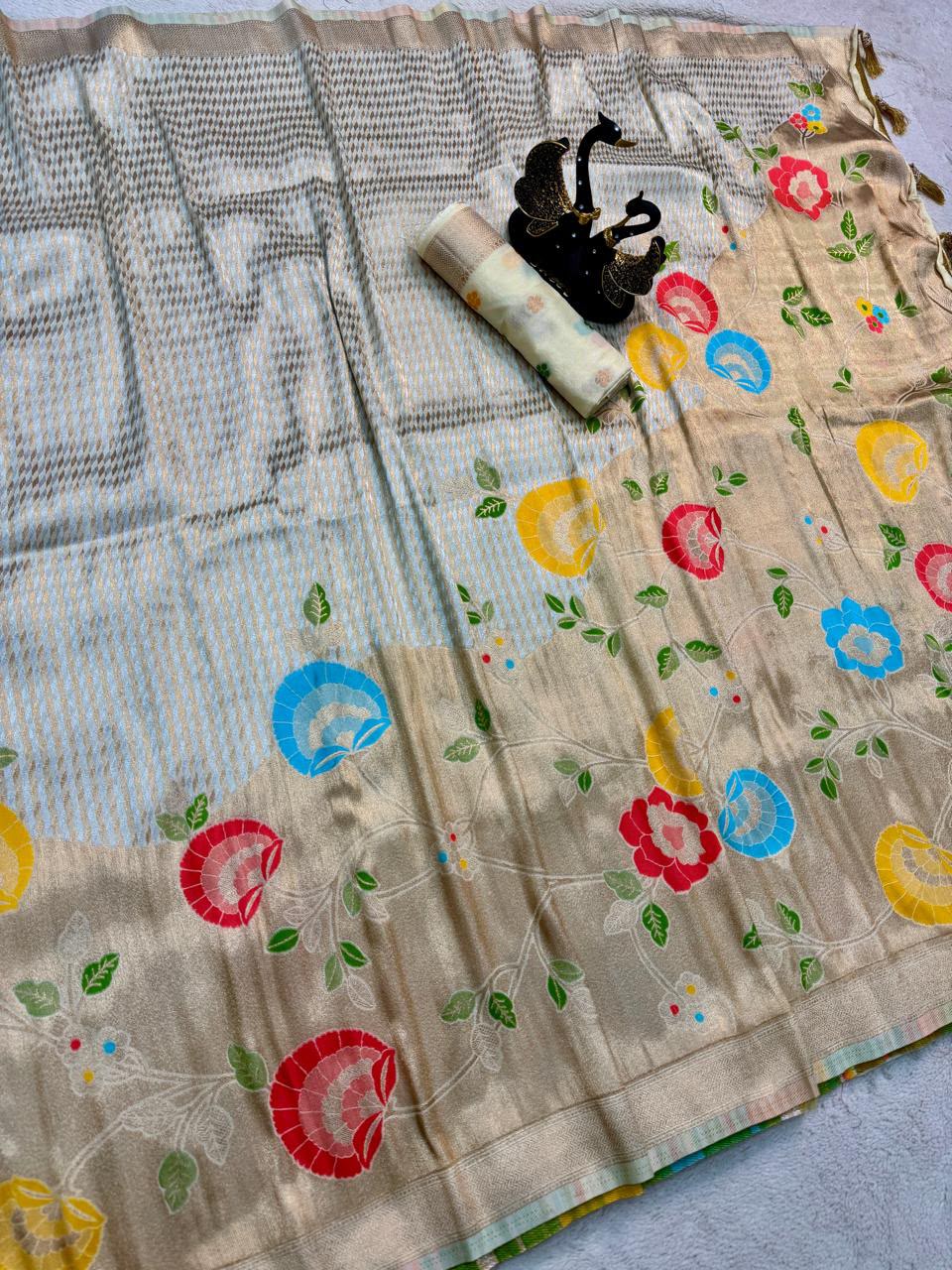 Stunner Off White Banarasi Khadi Silk Saree With Vibrant Blouse Piece