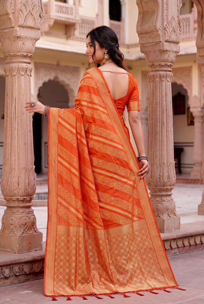 Comely Orange Banarasi Khadi Silk Saree With Jubilant Blouse Piece