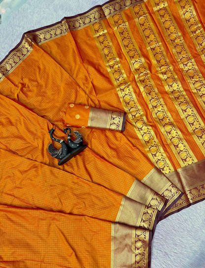Impressive Mustard Pure Banarasi Silk Saree With Demure Blouse Piece
