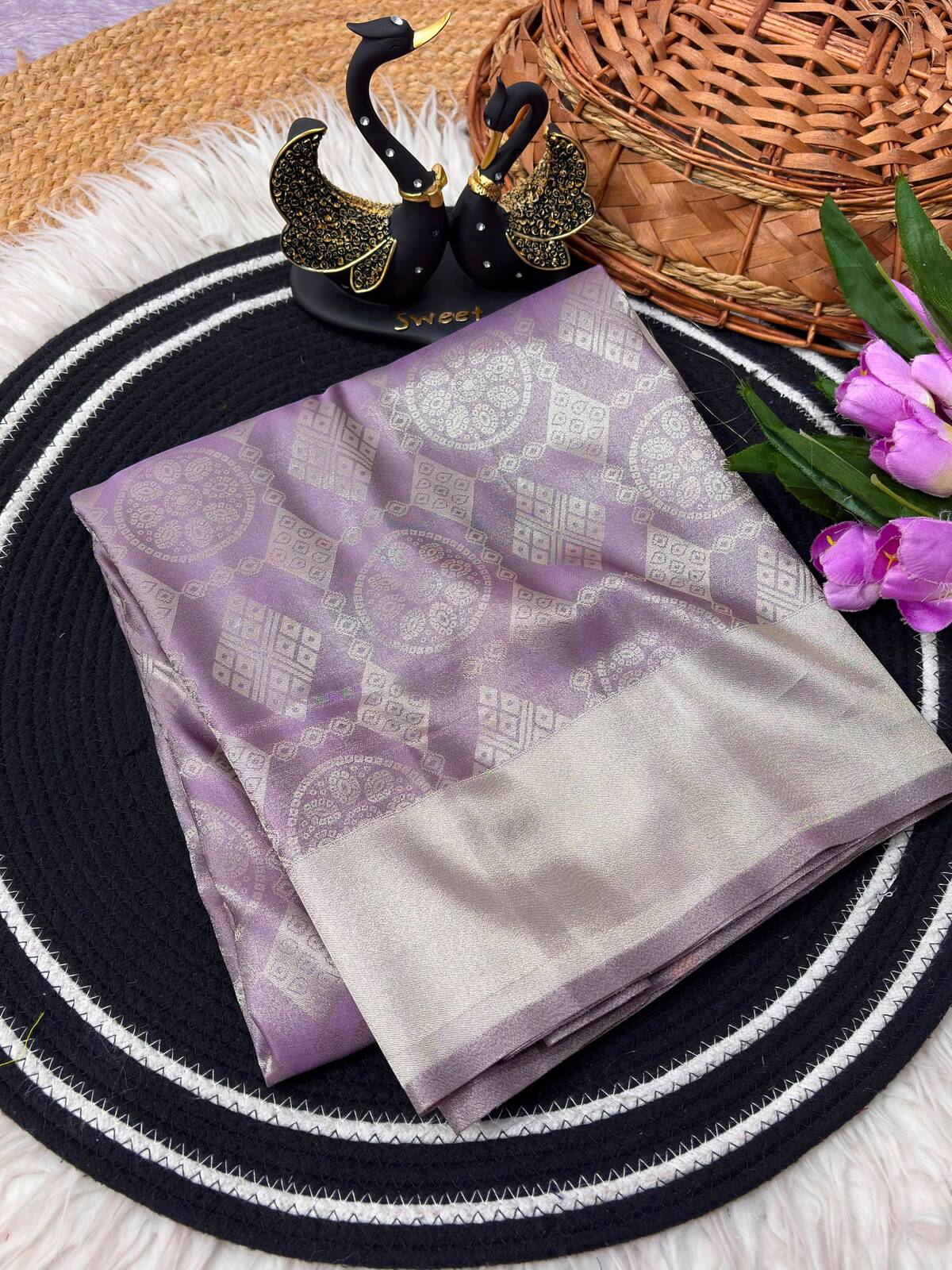 Arresting Lavender Banarasi Tissue Silk Saree With Excellent Blouse Piece