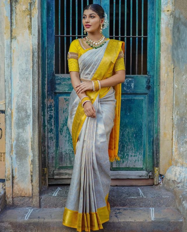 Jazzy Off White Soft Silk Saree With Adorning Blouse Piece