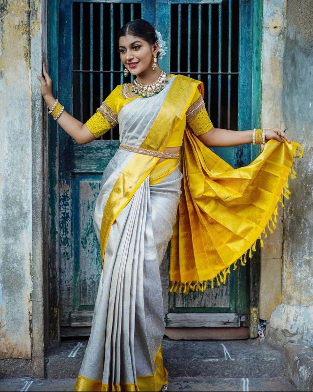 Jazzy Off White Soft Silk Saree With Adorning Blouse Piece