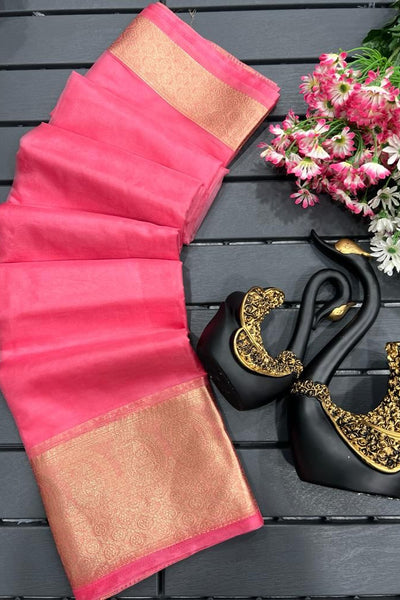 Exquisite Pink Organza Silk Saree With Cynosure Blouse Piece