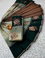 Embellished Pista Soft Banarasi Silk Saree With Opulent Blouse Piece