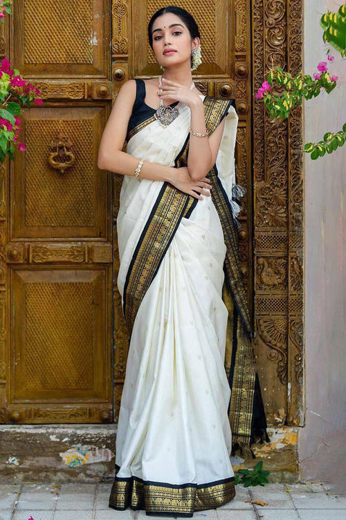 Load image into Gallery viewer, Surpassing Off White Soft Silk Saree With Flameboyant Blouse Piece
