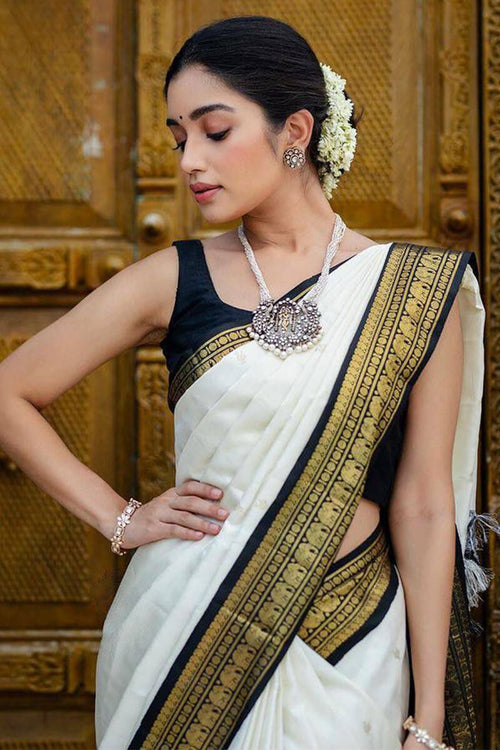 Load image into Gallery viewer, Surpassing Off White Soft Silk Saree With Flameboyant Blouse Piece
