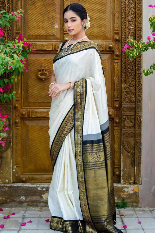 Load image into Gallery viewer, Surpassing Off White Soft Silk Saree With Flameboyant Blouse Piece
