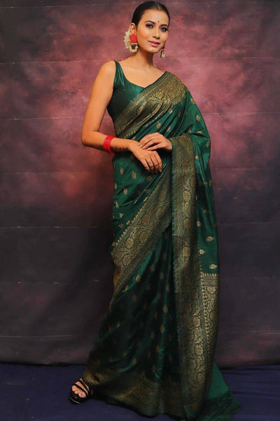 Adorning Dark Green Soft Silk Saree With Prominent Blouse Piece