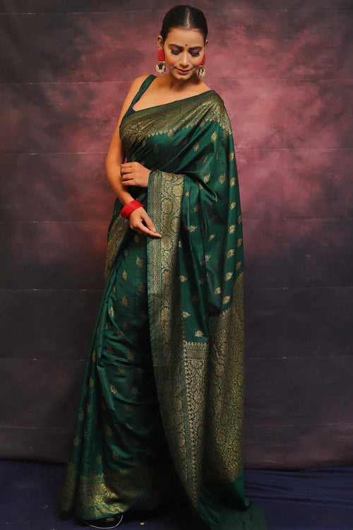 Load image into Gallery viewer, Adorning Dark Green Soft Silk Saree With Prominent Blouse Piece
