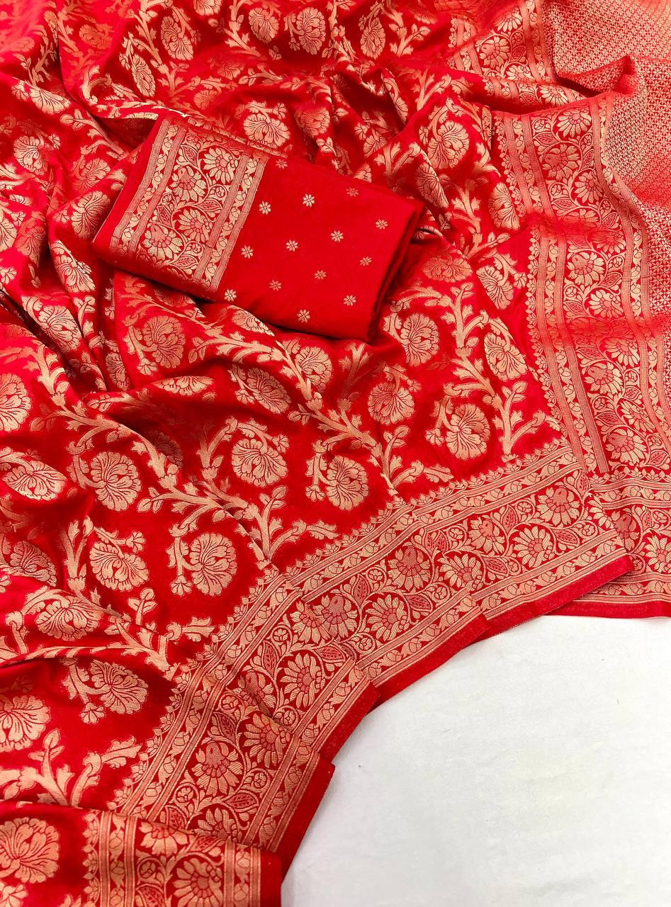 Demure Red Soft Banarasi Silk Saree With Eloquence Blouse Piece