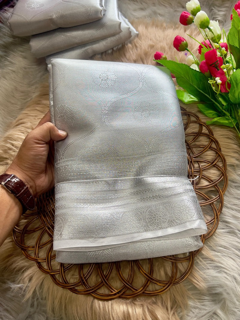 Bollywood Style Silver Soft Tissue Silk Saree With Winsome Blouse Piece