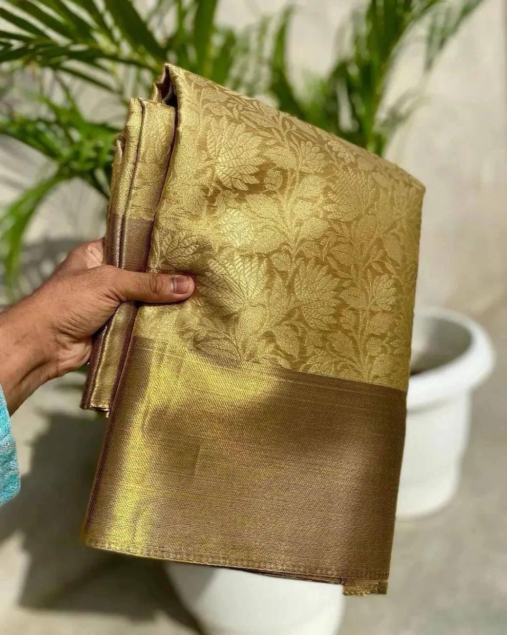 Engaging Golden Soft Tissue Silk Saree With Prodigal Blouse Piece