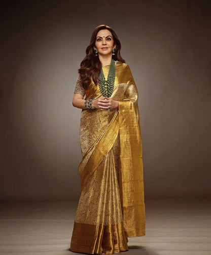 Engaging Golden Soft Tissue Silk Saree With Prodigal Blouse Piece