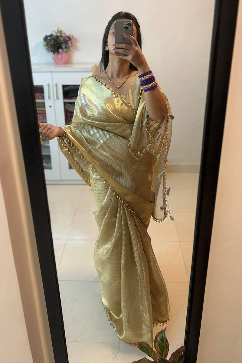 Fancifull Golden Soft Tissue Silk Saree With Demesne Blouse Piece