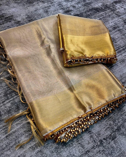 Fancifull Golden Soft Tissue Silk Saree With Demesne Blouse Piece