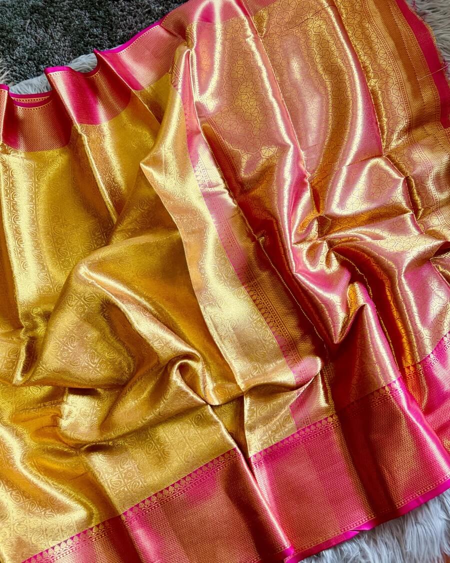 Bollywood Style Golden Soft Tissue Silk Saree With Artistic Blouse Piece