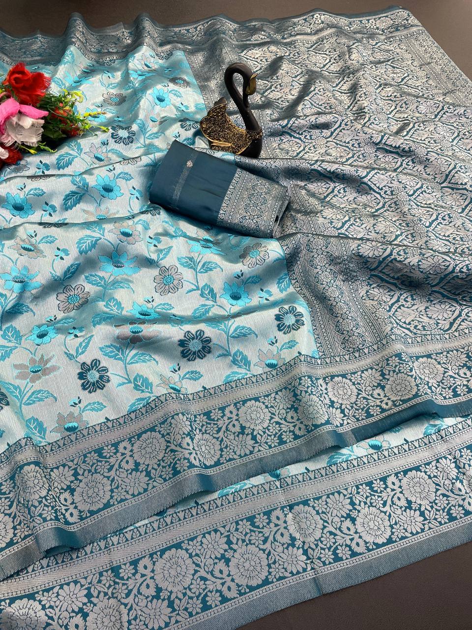 Outstanding Sky Soft Banarasi Tissue Silk Saree With Scintilla Blouse Piece