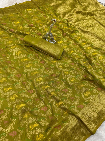 Cynosure Green Soft Banarasi Silk Saree With Precious Blouse Piece