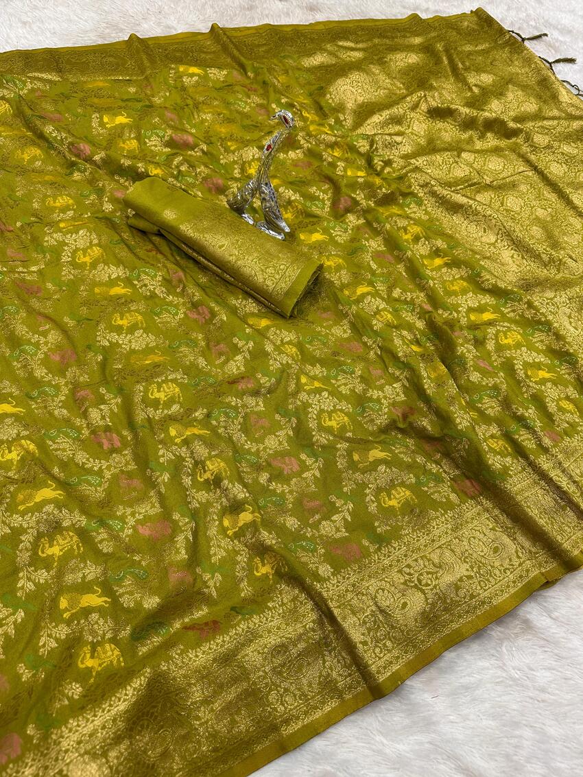 Cynosure Green Soft Banarasi Silk Saree With Precious Blouse Piece