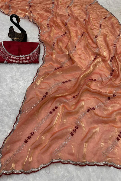 Embrocation Orange Sequence Work Fandy Silk Saree With Gratifying Blouse Piece