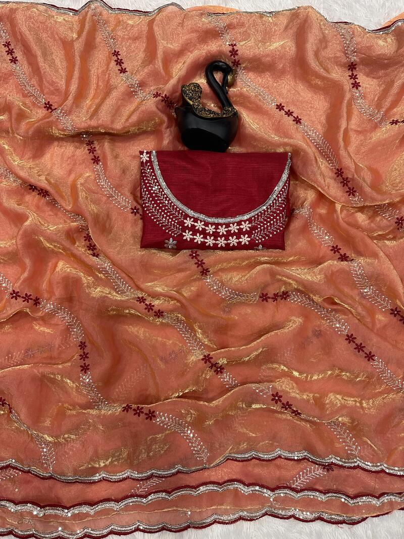 Embrocation Orange Sequence Work Fandy Silk Saree With Gratifying Blouse Piece