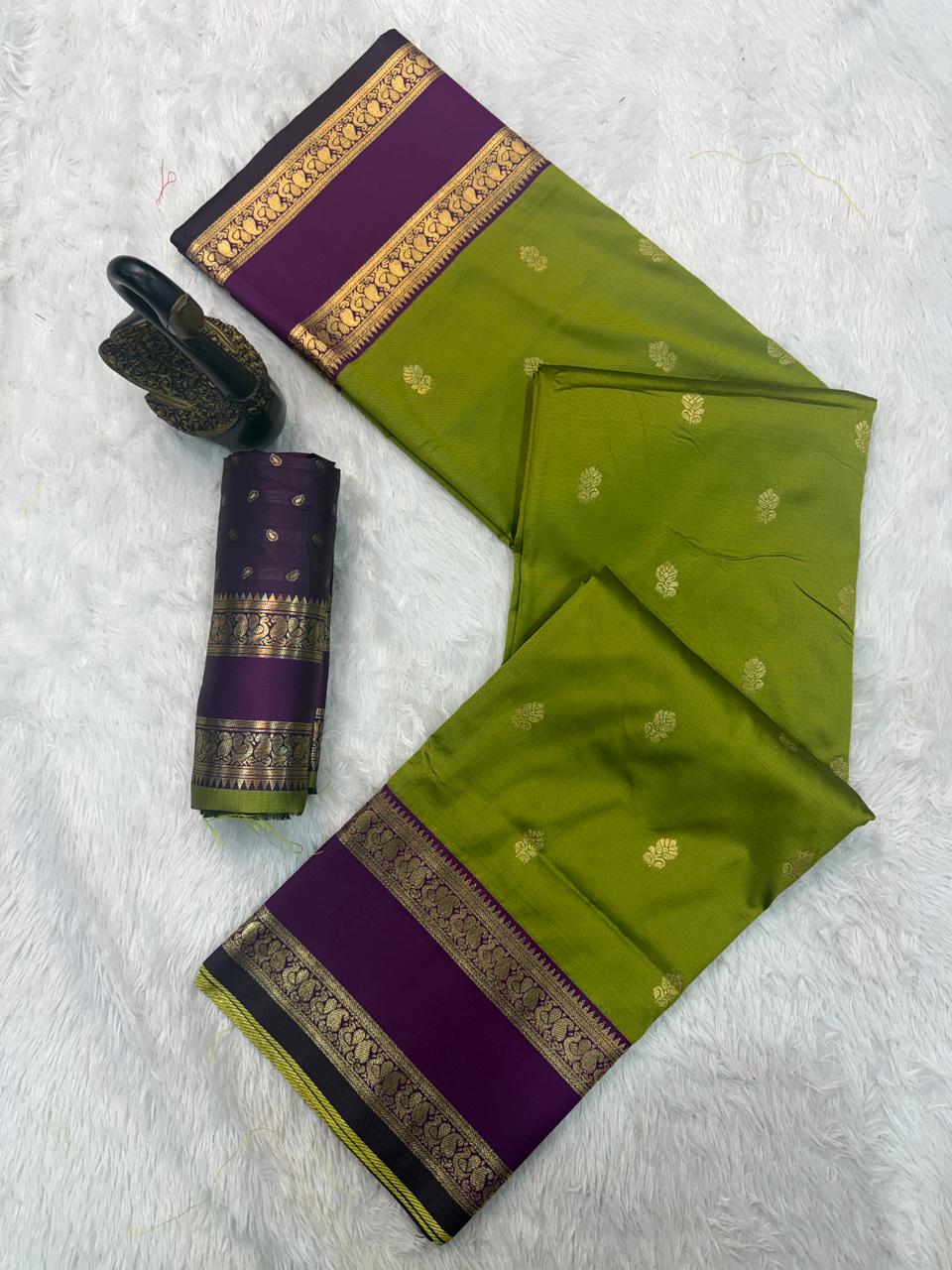 Quixotic Mehndi Soft Banarasi Kathpadar Silk Saree With Seraphic Blouse Piece