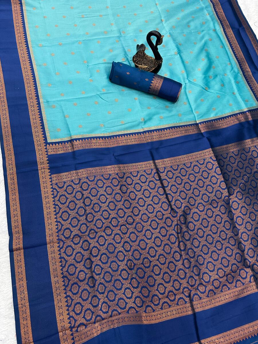 Fancifull Firozi Soft Banarasi Silk Saree With Sonorous Blouse Piece