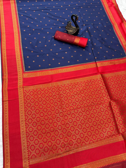 Radiant Navy Blue Soft Banarasi Silk Saree With Fugacious Blouse Piece