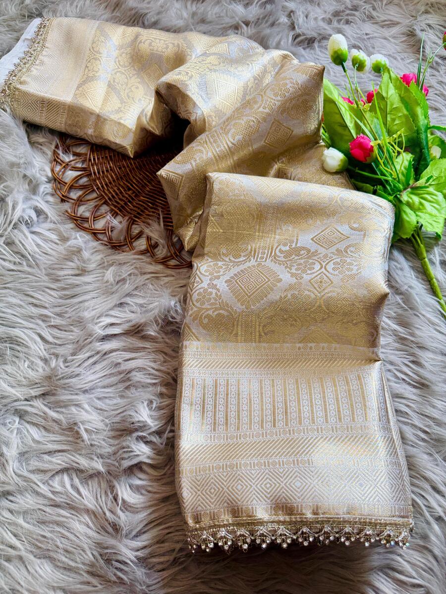 Fancifull Beige Soft Tissue Silk Saree With Classy Blouse Piece