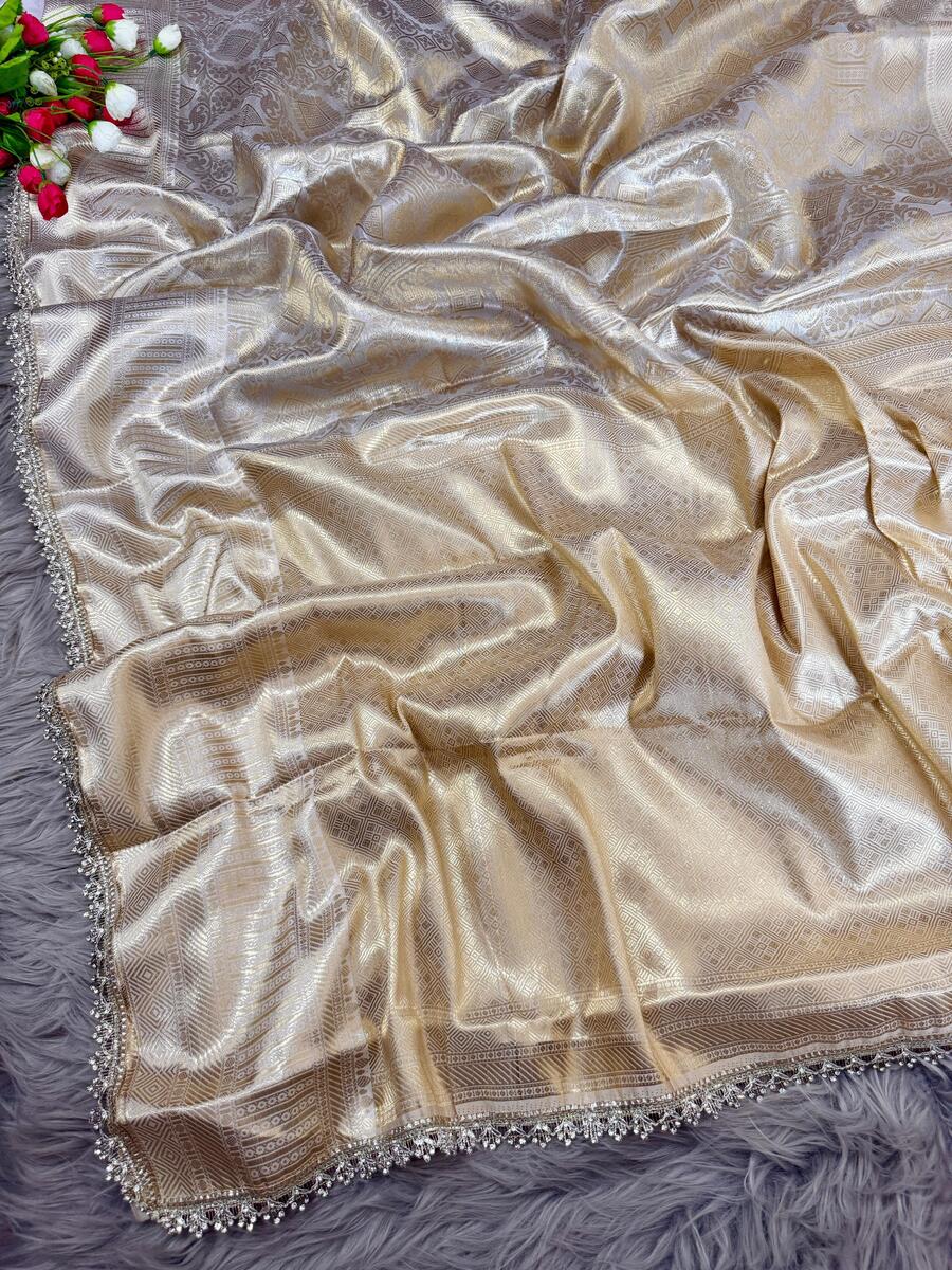 Fancifull Beige Soft Tissue Silk Saree With Classy Blouse Piece