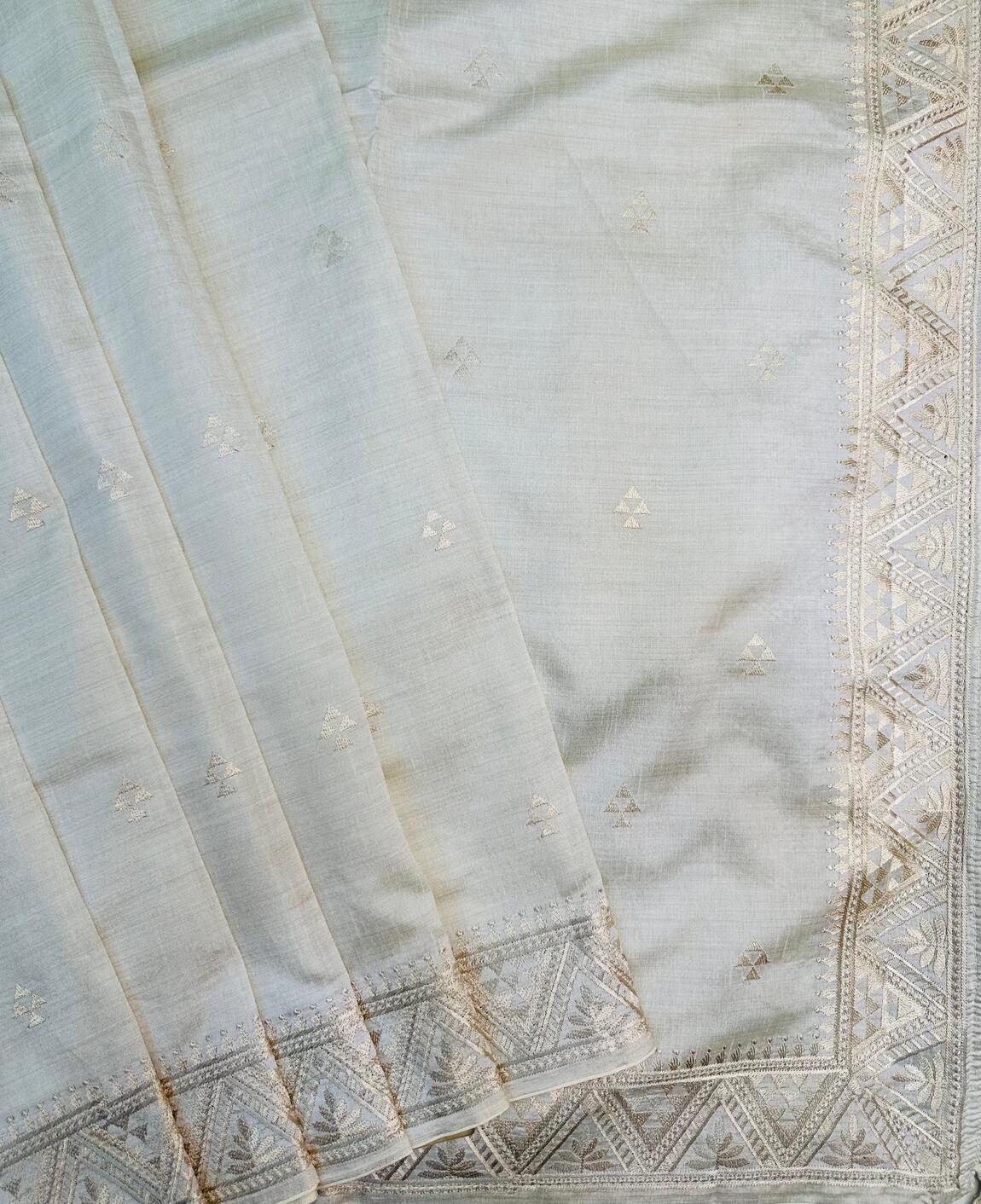 Delightful Off White Embroidery Work Tussar Silk Saree With Inimitable Blouse Piece