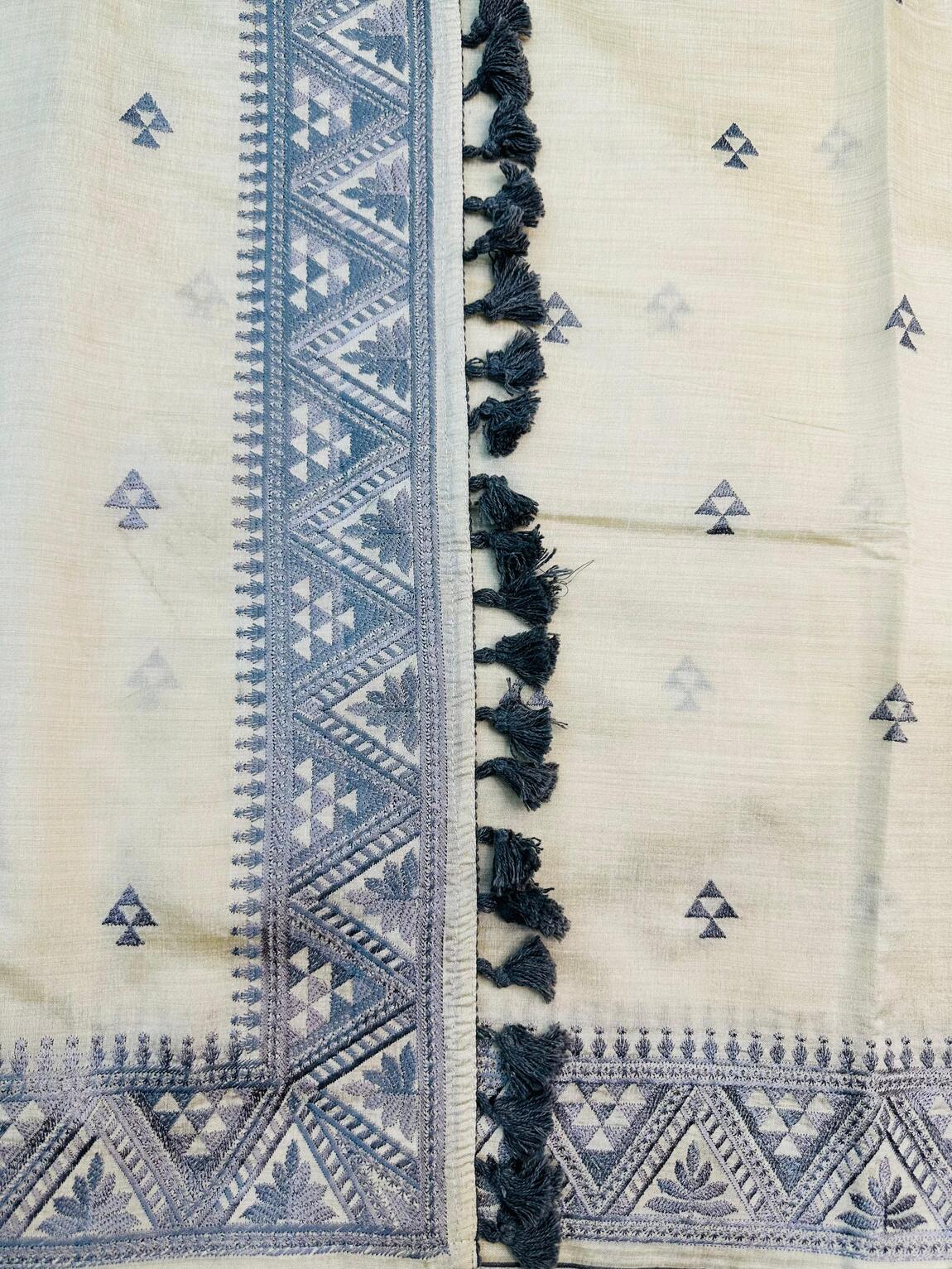 Cynosure Off White Embroidery Work Tussar Silk Saree With Smart Blouse Piece