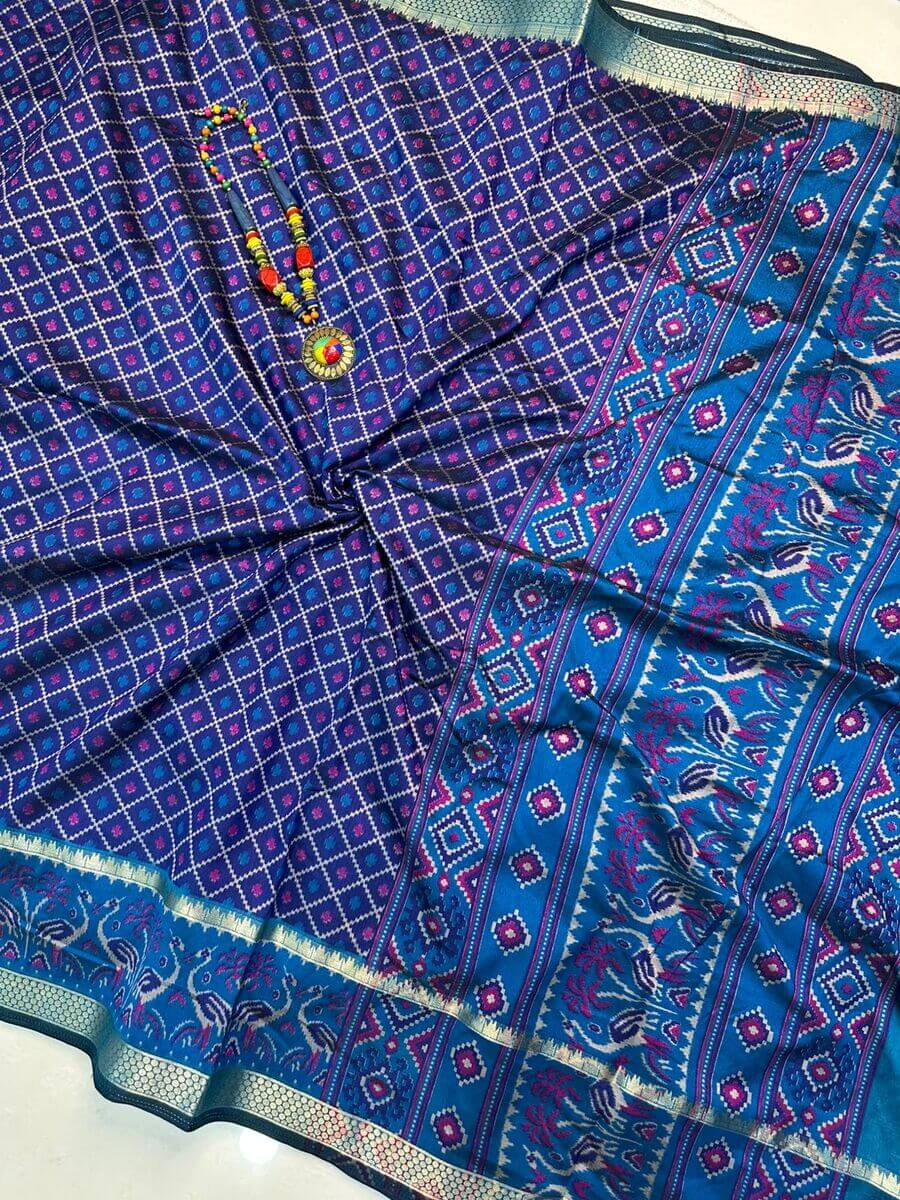 Trendy Navy Blue Soft Printed Patola Silk Saree with Flameboyant Blouse Piece