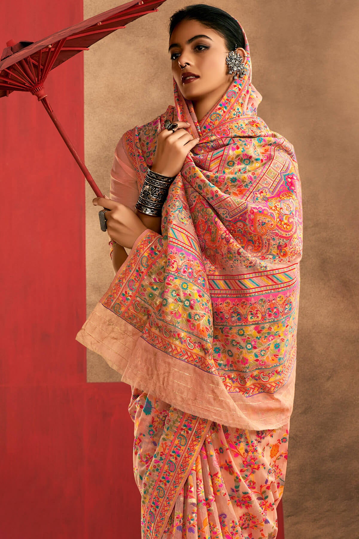 Delectable Peach Pashmina Saree With Panache Blouse Piece