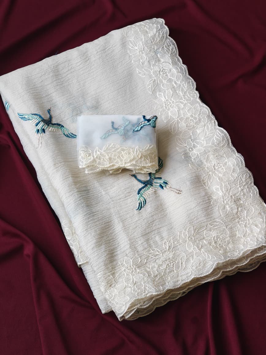 Precious Off White Embroidery Work Crush Silk Saree With Charming Blouse Piece